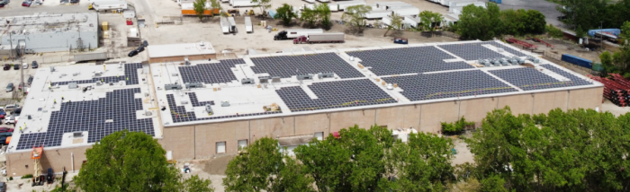 Modern commercial warehouse featuring sustainable energy with solar 