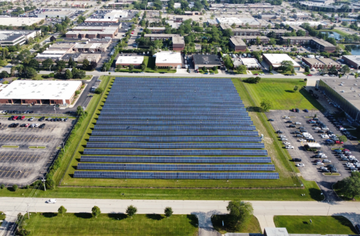 Large scale solar field powering a manufacturing building.