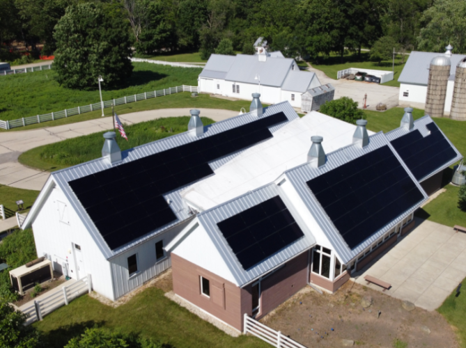 A learning facility with a solar system installed on two roof planes.